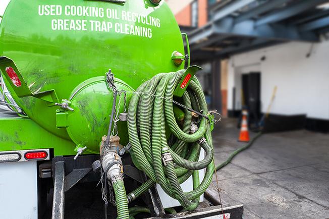 workers at Grease Trap Cleaning of Lockport